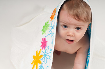 Image showing Baby boy in white floral towel