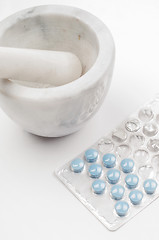 Image showing Blue drugs (tablets) and marble mortar