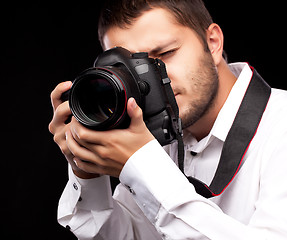 Image showing Photographer with camera