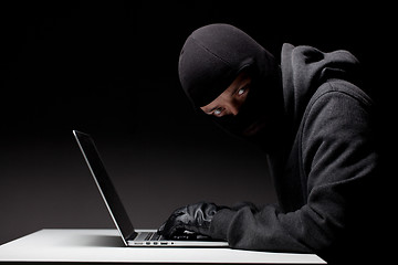 Image showing Computer hacker in a balaclava