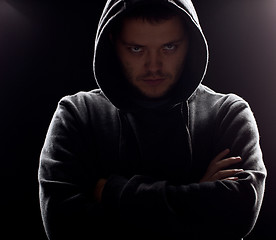 Image showing Silhouette of man in the hood or hooligan