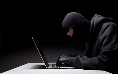 Image showing Computer hacker in a balaclava