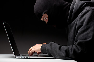 Image showing Computer hacker in a balaclava