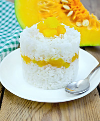 Image showing Rice with pumpkin on board