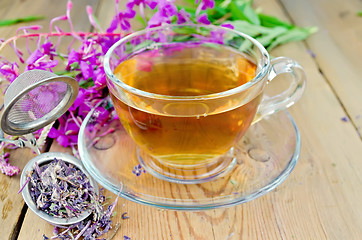 Image showing Herbal tea from fireweed in a glass cup with strainer