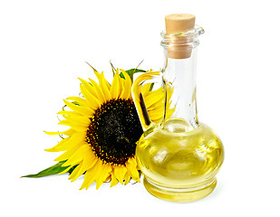 Image showing Vegetable oil in a carafe with a sunflower