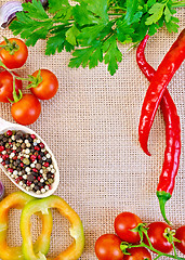 Image showing Frame of vegetables and spices on burlap