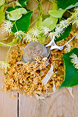 Image showing Herbal tea from linden flowers in a tea strainer