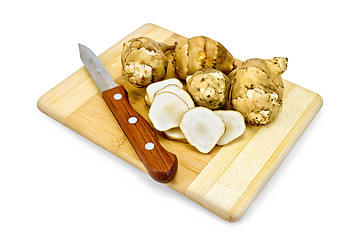 Image showing Jerusalem artichoke with a knife