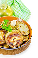 Image showing Zucchini fried in a ceramic bowl with a napkin