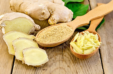 Image showing Ginger powder and grated in the spoon with the root and leaves