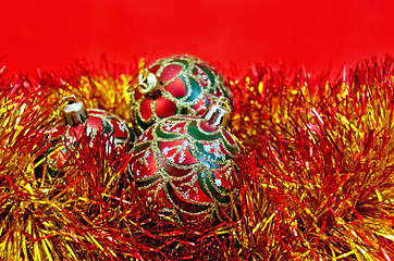 Image showing Christmas red balls with tinsel