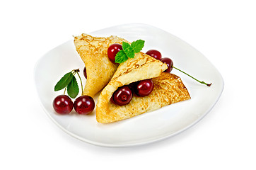 Image showing Pancakes with cherries on a plate