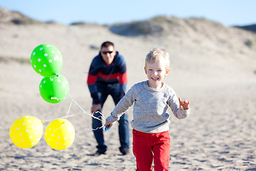 Image showing family at the beach