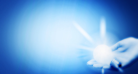 Image showing Background with lit lightbulb