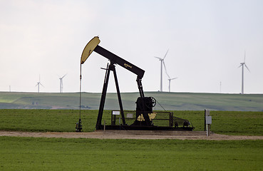 Image showing Pump Jack and wind farm