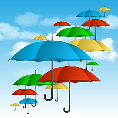 Image showing Vector colorful umbrellas flying high