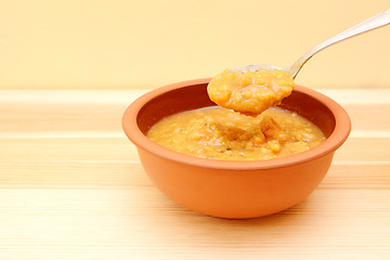 Image showing Closeup of spoonful of hearty lentil and vegetable soup 
