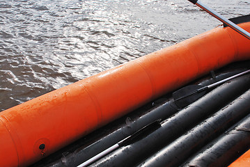 Image showing empty inflatable raft on the water