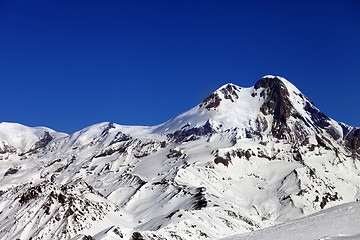 Image showing Mount Kazbek at sun winter day