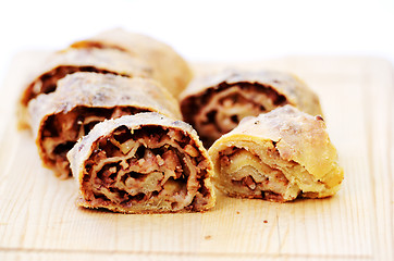 Image showing pieces of apple strudel on a board