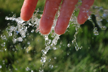 Image showing  Cold water on green background
