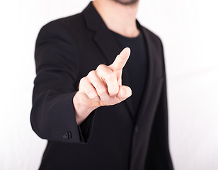 Image showing Businessman pressing an imaginary button