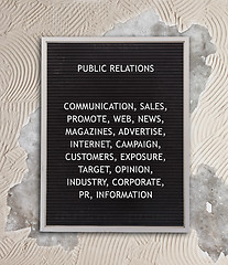 Image showing Public relations concept in plastic letters on very old menu boa