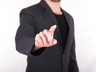 Image showing Businessman pressing an imaginary button