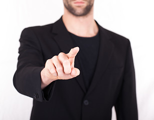 Image showing Businessman pressing an imaginary button