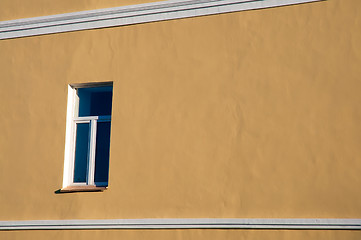 Image showing The window on the yellow wall.