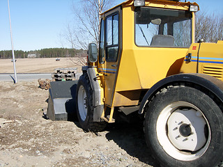 Image showing A working tractor