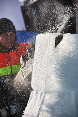 Image showing PETROZAVODSK, RUSSIA ? FEBRUARY 15: artist is cutting iceblock w