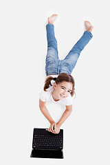 Image showing Little student girl with a laptop