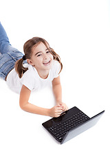 Image showing Little student girl with a laptop