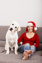 Image showing Woman with her dog on Christmas Day