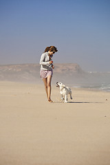 Image showing Girl with her cute dog