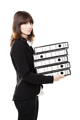 Image showing Tired business woman holding folders