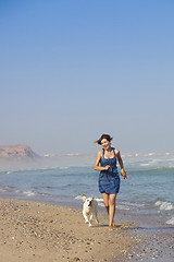 Image showing Girl with her dog