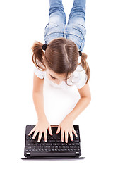 Image showing Little student girl with a laptop