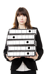 Image showing Tired business woman holding folders