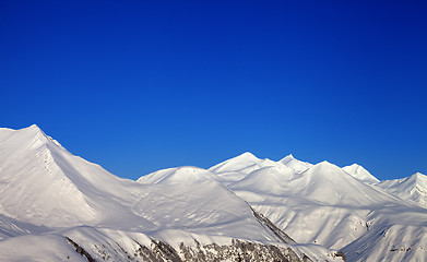 Image showing Snowy mountains and blue clear sky