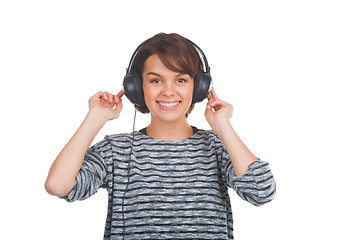 Image showing Pretty young girl listening music