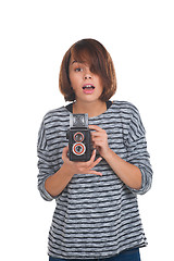 Image showing Lovely teenage girl with retro photo camera