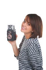 Image showing Lovely teenage girl with retro photo camera