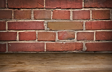 Image showing old brick wall and wooden flor