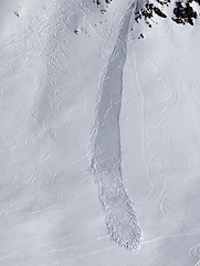 Image showing Off piste slope with trace of skis, snowboarding and avalanche