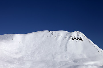 Image showing Off-piste slope with trace of skis, snowboarding and avalanche