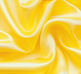 Image showing Smooth elegant golden silk as background