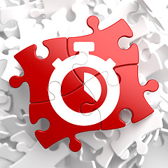 Image showing Stopwatch Icon on Red Puzzle.